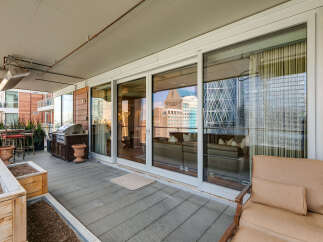 Enjoy luxurious outdoor living in this stunning condo with a spacious balcony.