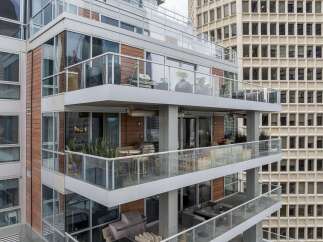 Experience luxury living with this stunning high-rise condo featuring multiple balconies and breathtaking city views.