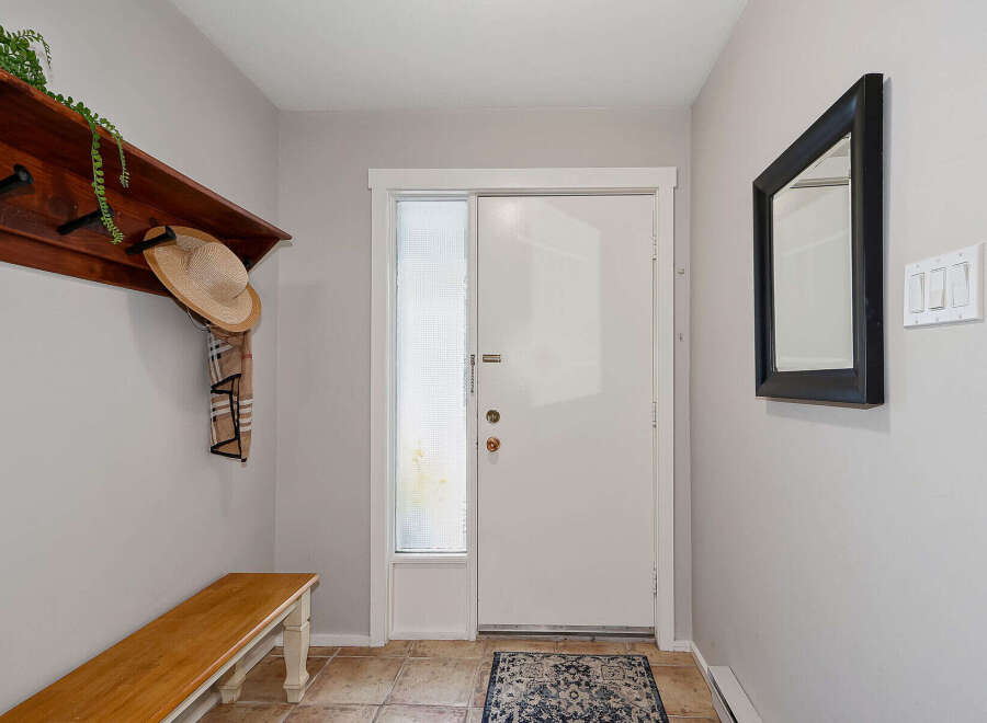 Step into this inviting entryway, perfect for welcoming guests.
