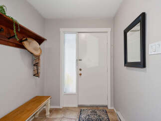 Step into this inviting entryway, perfect for welcoming guests.
