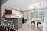 This stunning kitchen boasts a modern design with a functional layout.
