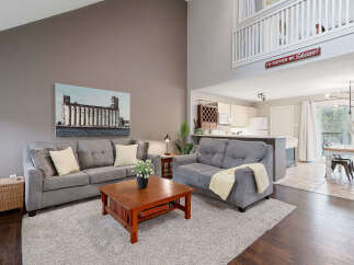 Step into this inviting living space, perfect for relaxation and entertaining.
