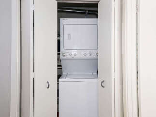 Discover the convenience of in-unit laundry with this stunning property! This home features a modern stacked washer and dryer, perfect for effortless laundry days.
