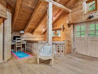 Step into a rustic haven with this stunning wooden interior.