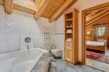 Experience rustic elegance in this stunning bathroom.