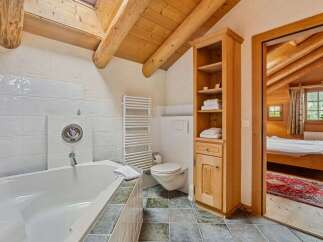 Experience rustic elegance in this stunning bathroom.