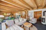 Step into a world of rustic elegance with this stunning property, showcasing a harmonious blend of natural wood elements and modern design.