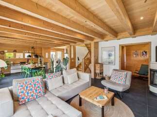Step into a world of rustic elegance with this stunning property, showcasing a harmonious blend of natural wood elements and modern design.