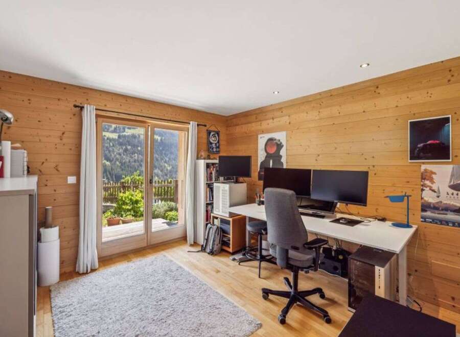 Experience the perfect blend of work and nature in this stunning home office.