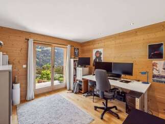 Experience the perfect blend of work and nature in this stunning home office.