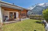 Escape to the Swiss Alps in this charming chalet, offering stunning mountain views and a tranquil setting.