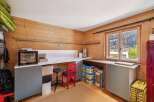 This charming property boasts a cozy workspace with ample natural light, perfect for creative endeavors or remote work.