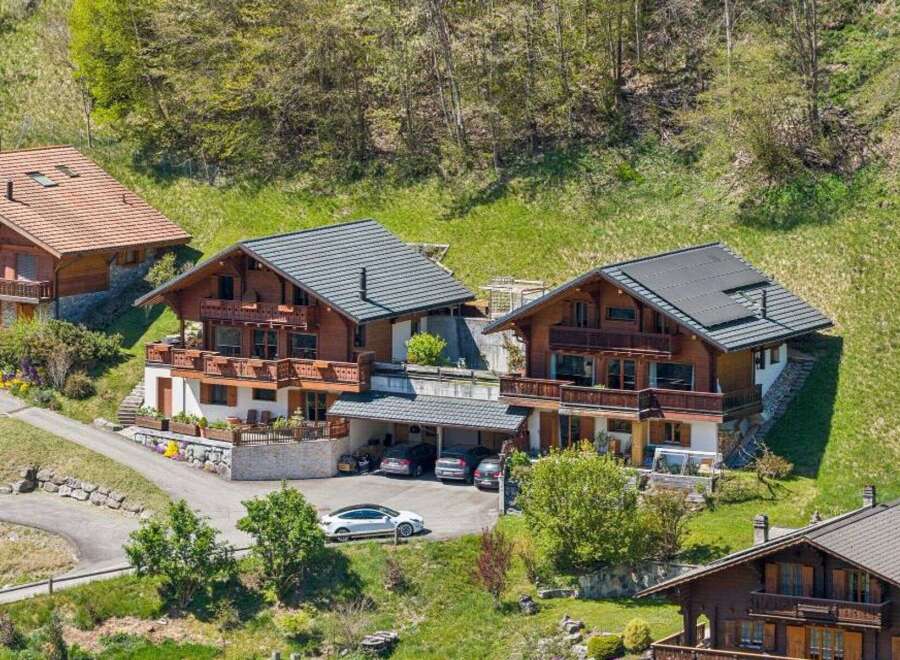 Discover the charm of these stunning chalets nestled in a picturesque mountain setting.