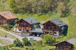 Discover the charm of these stunning chalets nestled in a picturesque mountain setting.