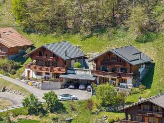 Discover the charm of these stunning chalets nestled in a picturesque mountain setting.