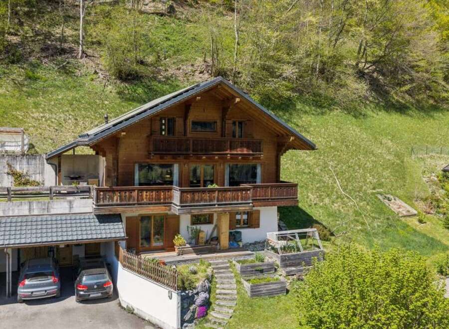 This stunning wooden chalet offers a perfect blend of rustic charm and modern comfort.