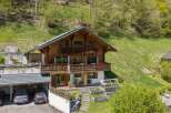 This stunning wooden chalet offers a perfect blend of rustic charm and modern comfort.