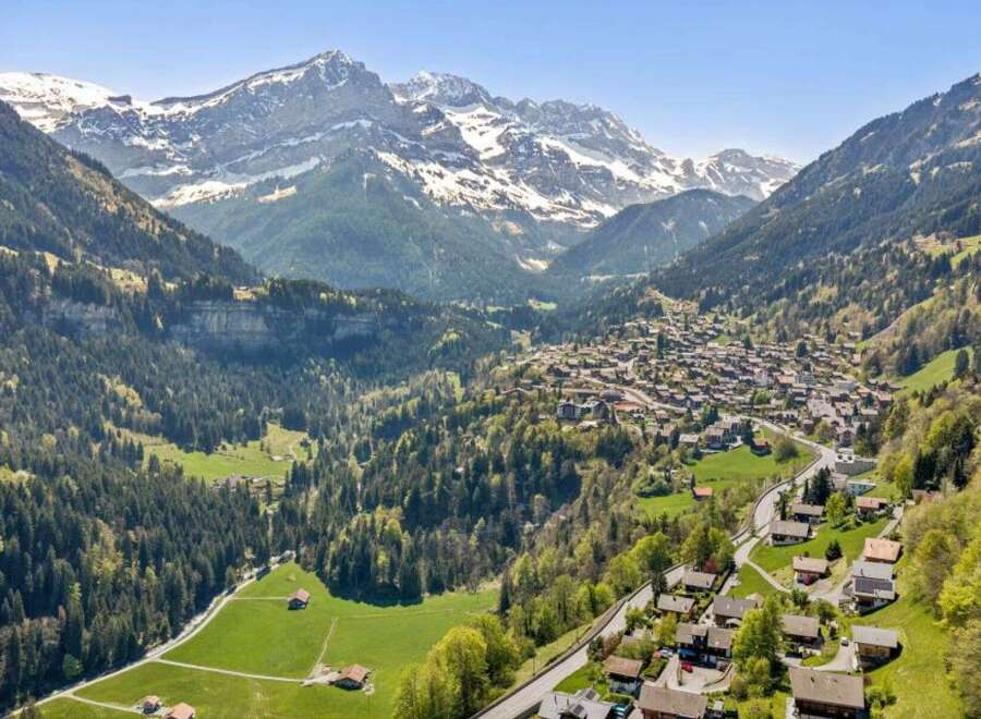 Nestled in a picturesque valley, this stunning property offers breathtaking mountain views and a tranquil escape.