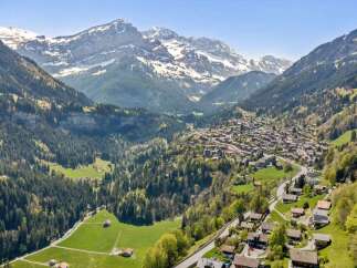 Nestled in a picturesque valley, this stunning property offers breathtaking mountain views and a tranquil escape.