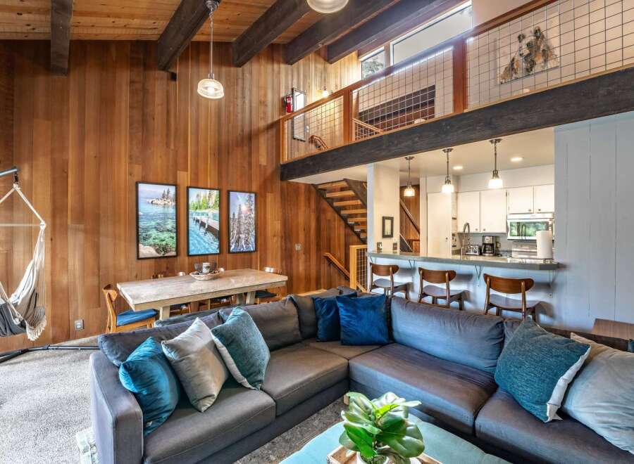 This stunning property boasts a warm and inviting interior with a unique architectural design.