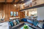 This stunning property boasts a warm and inviting interior with a unique architectural design.