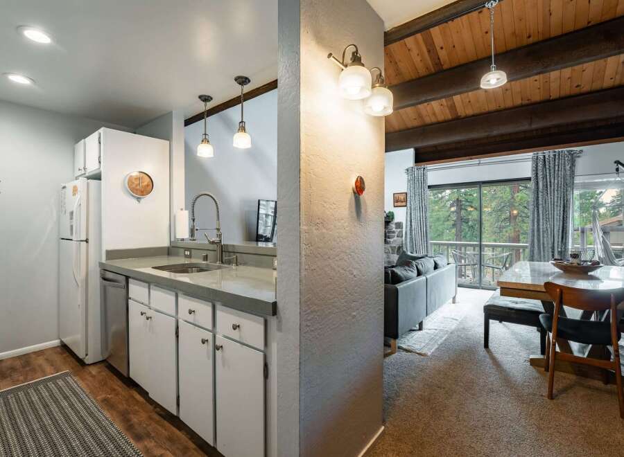 Discover the charm of this inviting property, featuring a well-equipped kitchen with modern appliances and ample counter space.