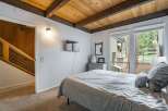 This cozy bedroom features a comfortable bed, perfect for relaxing after a long day.