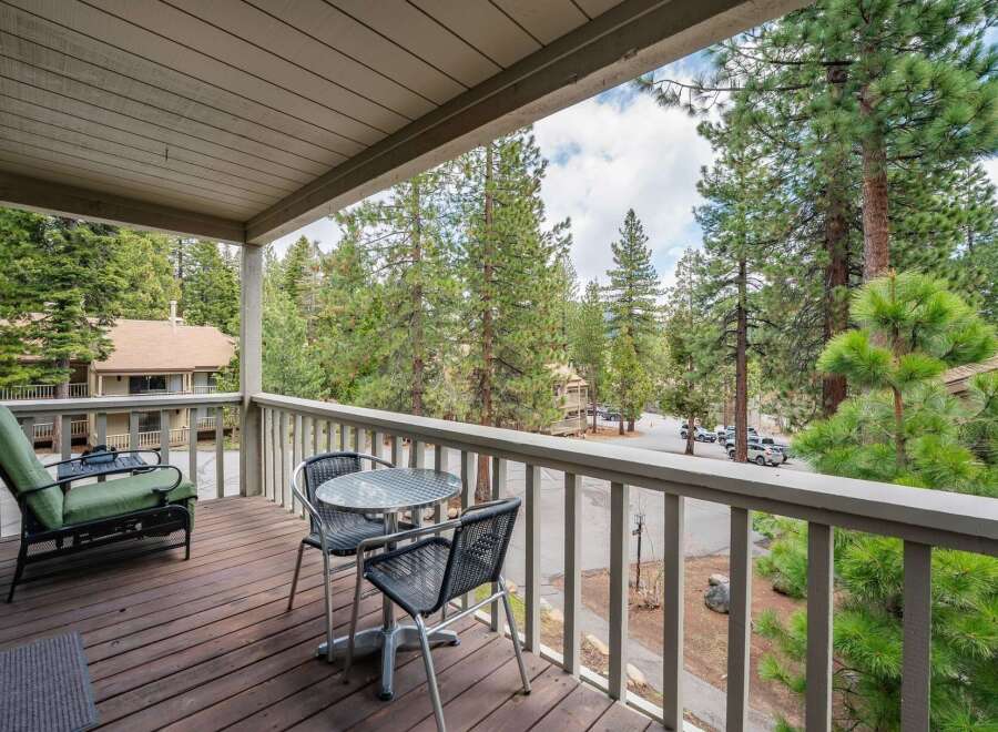 Enjoy the tranquility of this charming property with a private balcony overlooking a serene forest.