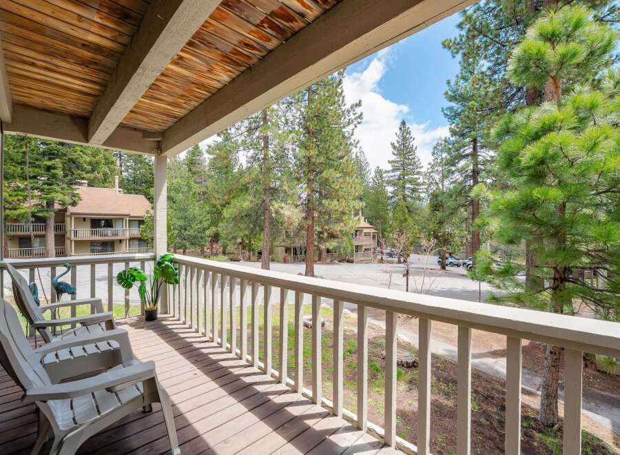 Enjoy the serene views from this charming property's balcony, perfect for morning coffee or evening relaxation.