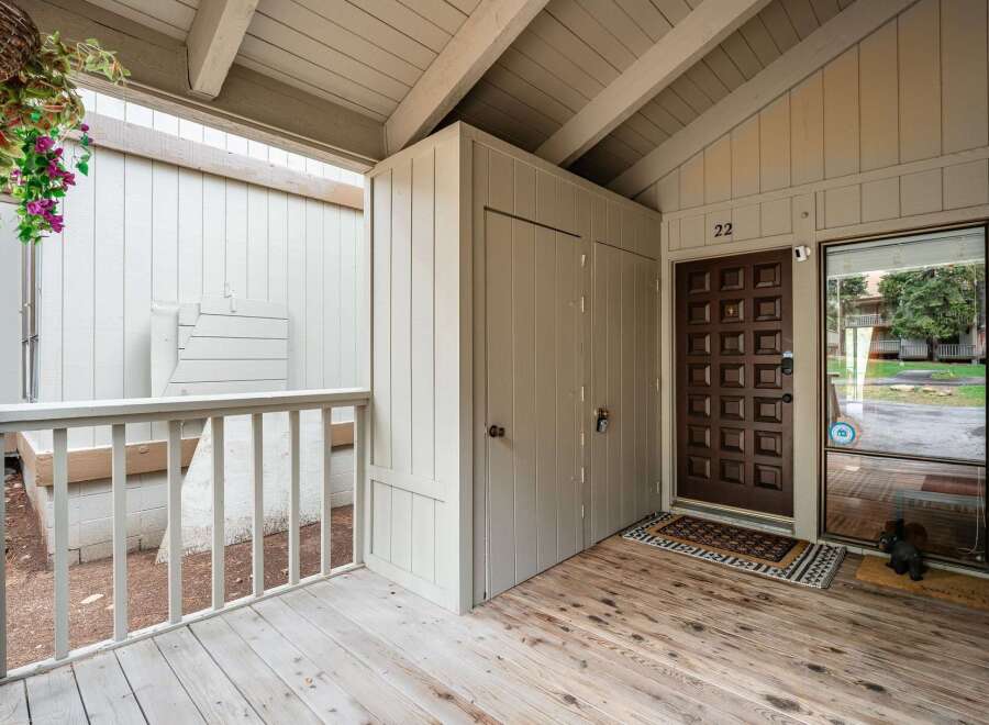 Welcome to this charming property featuring a covered porch and inviting entryway.