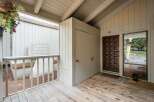 Welcome to this charming property featuring a covered porch and inviting entryway.