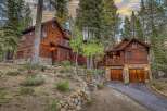 Nestled amidst towering trees, this stunning wooden cabin offers a serene escape.