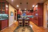 Step into this stunning kitchen, a perfect blend of rustic charm and modern convenience.