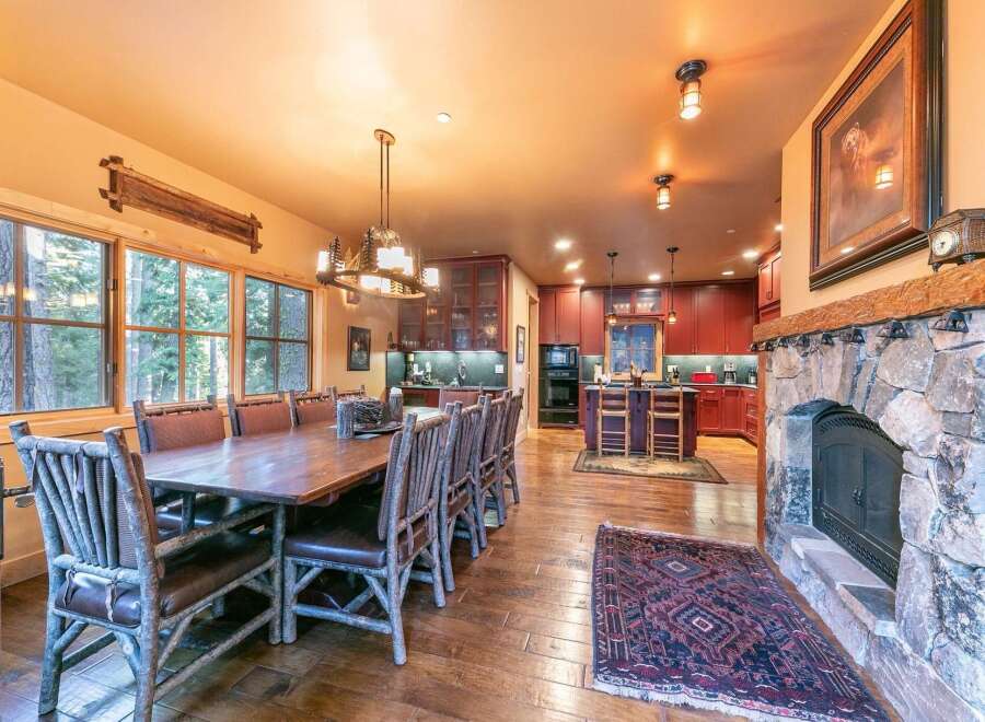 Step into luxury with this stunning property featuring a spacious dining area perfect for entertaining.