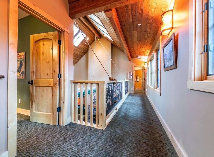 Step into luxury with this stunning property featuring a beautifully designed hallway.