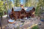 Nestled in a serene forest setting, this stunning property boasts a luxurious hot tub, perfect for relaxation.