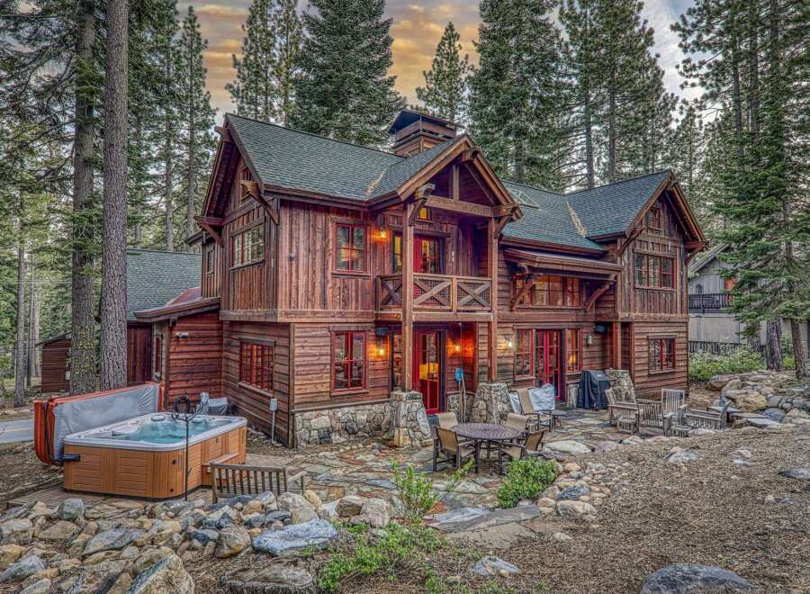 Escape to your dream mountain retreat! This stunning cabin boasts a rustic charm with its wooden exterior and inviting ambiance.