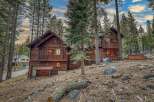 Nestled amidst towering trees, this stunning wooden cabin offers a serene escape.