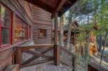 Nestled in a serene, wooded setting, this stunning property boasts exquisite wooden architecture and a charming rustic design.