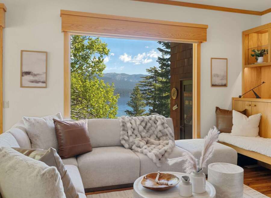 Experience breathtaking lake and mountain views from this stunning property.