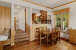 Step into this stunning home featuring a warm and inviting dining area.