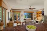 Experience luxury living in this stunning property, featuring a bright and airy living room with large windows that offer breathtaking views.