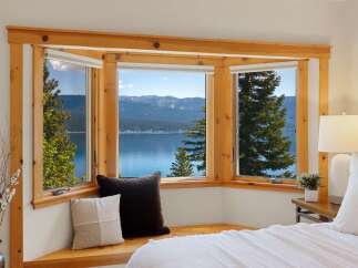 Enjoy breathtaking lake and mountain views from this stunning property.