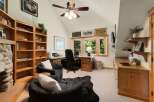 This stunning home office boasts a cozy and inviting atmosphere, perfect for productivity and relaxation.