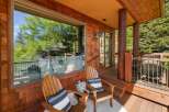 Enjoy the tranquility of this stunning property featuring a cozy outdoor seating area.