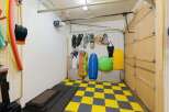 This well-organized garage offers ample storage solutions for your belongings.