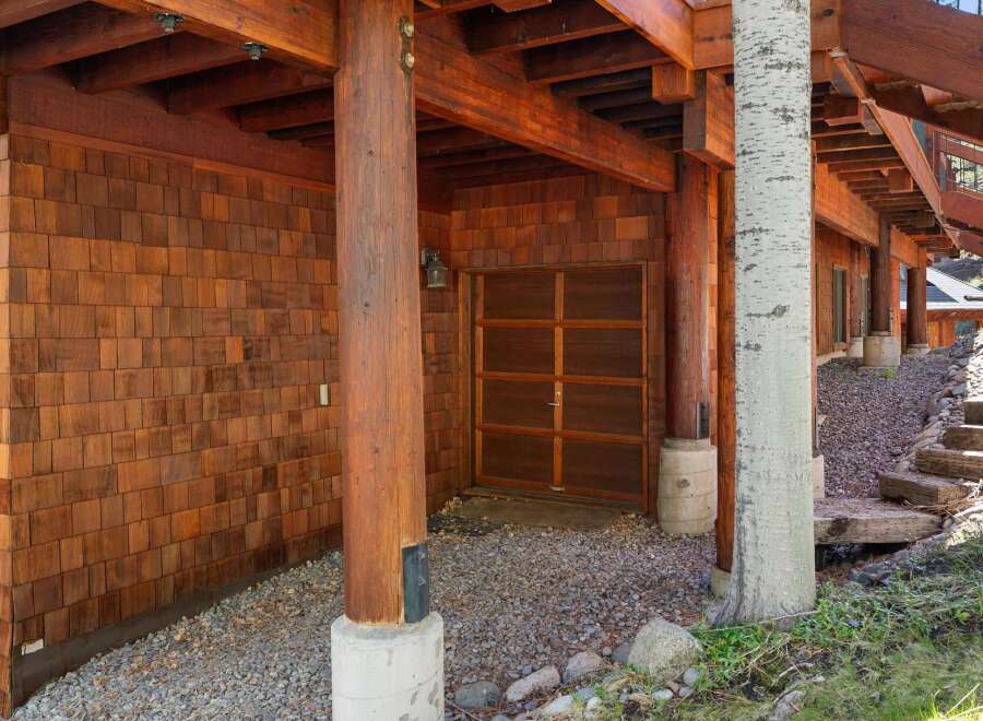 This stunning property showcases exquisite craftsmanship and natural beauty.