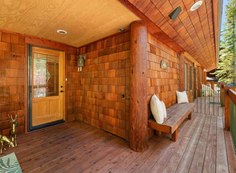 Step into rustic charm with this inviting porch.