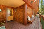 Step into rustic charm with this inviting porch.