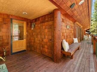 Step into rustic charm with this inviting porch.